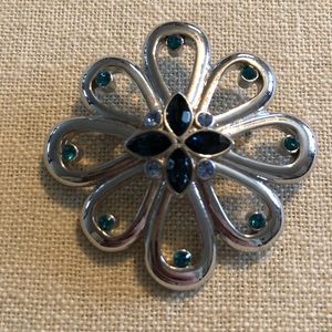 Beautiful silver brooch with blue stones